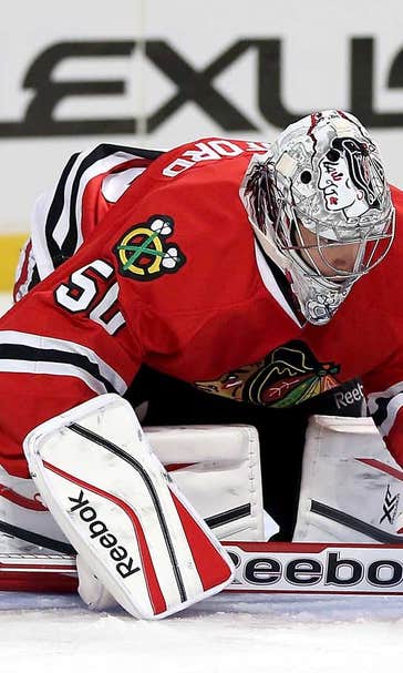 Blackhawks shut out Blues for Quenneville's 700th win; Kane hurt